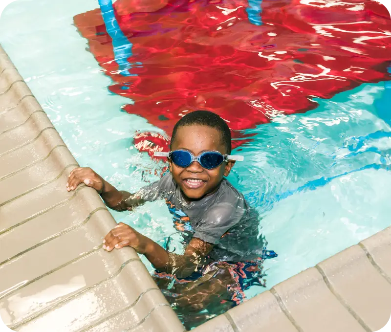 Photos of swim lessons and community events at FINS Swim School Atascocita