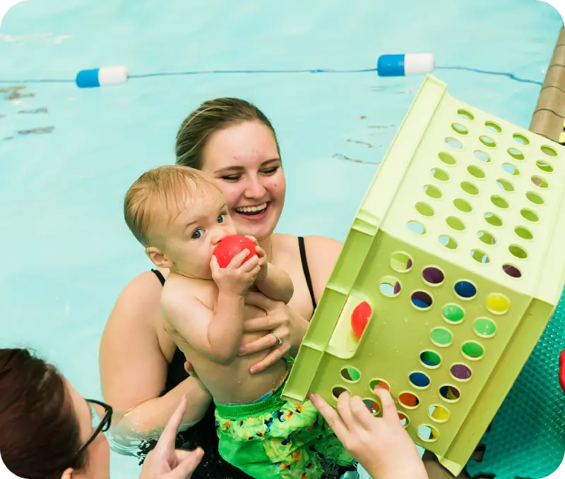 Photos of swim lessons and community events at FINS Swim School Atascocita