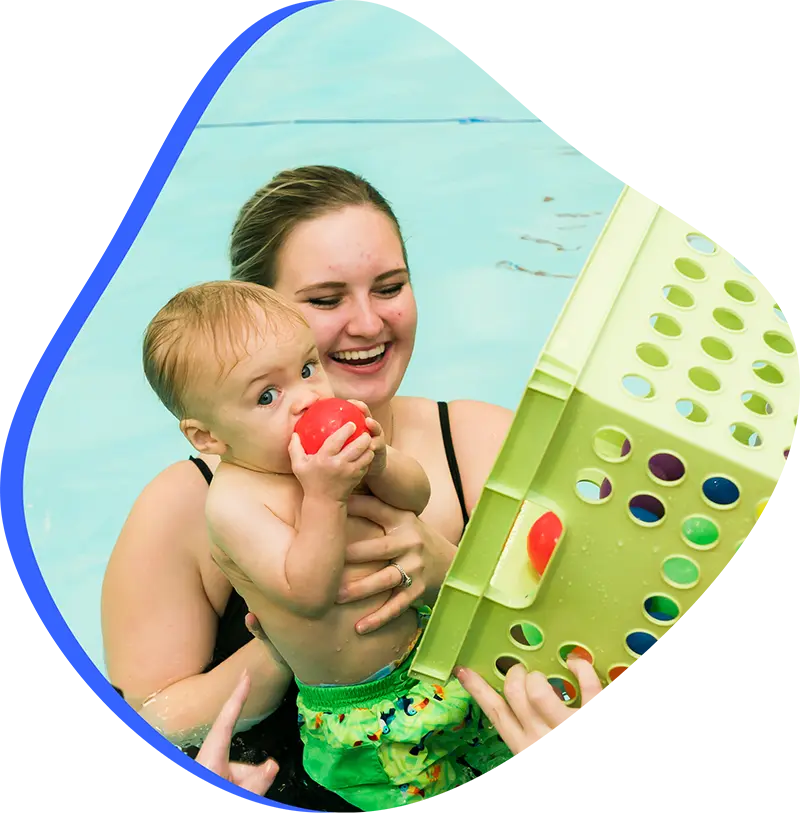 An adult swimmer receiving personalized one-on-one coaching from a FINS instructor in Atascocita.