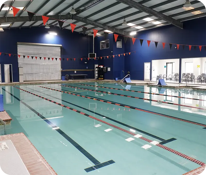 Photos of swim lessons and community events at FINS Swim School Fleet TX