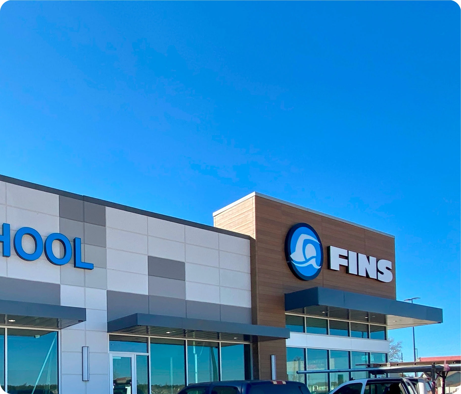 Photos of swimmers and instructors during private swim lessons and events at FINS Grand Parkway.