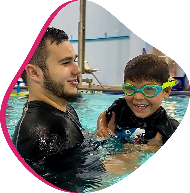 A student and FINStructor practicing stroke refinement during a private 1-on-1 swim program at FINS The FINStructor.